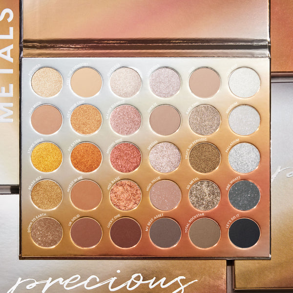 Metallic Mood opens to 30 neutral-to-metallic pans arranged 6x5, showcasing shimmery golds, coppers, silvers, rose tones, taupes, and matte black in a bronze ombré case; part of the ColourPop Shadow Palette & Brush Set for glam eye looks.