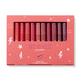 Heat Warning ColourPop Lippie Vault Set showcasing 10 Lippie Stix in gradient shades from bright coral and pink to berry and plum, arranged upright behind a clear window in a coral box labeled 'Hot In Here' with star and lightning graphics.