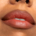 Full lips lined and softly filled with BFF3, a warm terracotta-brown ColourPop Lippie Pencil, showing precise edges and a smooth satin finish in a tight beauty swatch close-up.