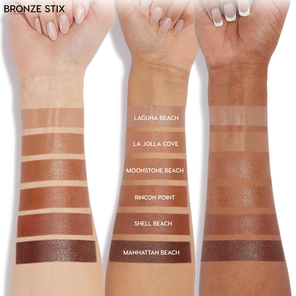 ColourPop Bronzer Stix Laguna Beach swatched on three arms, shown alongside labeled shades La Jolla Cove, Moonstone Beach, Rincon Point, Shell Beach, and Manhattan Beach; creamy tan-to-deep bronze stripes reveal pigment and finish in studio light.