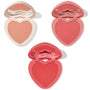 Three heart-shaped blush compacts showcase soft peach, warm coral, and vibrant rosy red pans with built-in mirrors on a white background; Cupid Called, a ColourPop Heart Powder Blush Set delivering buildable powder cheek color.