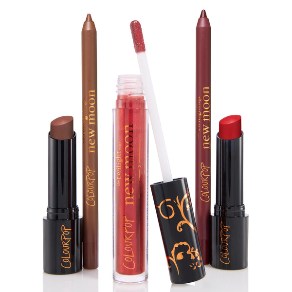 Pack Member ColourPop Lip Set displaying two New Moon lip liners (brown and berry), a shimmery red gloss with doe-foot wand, and two lipsticks - nude brown and vibrant red - in black tubes with gold script, arranged upright on a white background.