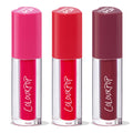 Very Berry ColourPop Lip Stain trio standing upright, showcasing bold berry shades - fuchsia, cherry red, and deep plum - in clear tubes with ColourPop logo and heart-shaped caps, lined up on a white background.