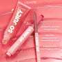 ColourPop So Juicy Plumping Lip Liner with Peptides in Mocha Latte angled open to show creamy brown tip, paired with So Juicy gloss on a glossy pink surface, highlighting instant plump, peptide-smooth lines, and peppermint tingle.