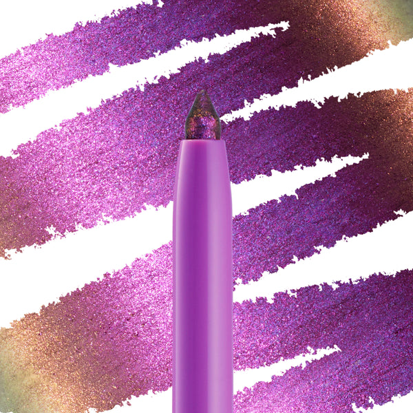Actin' Up ColourPop Chrome Crème Gel Liner pencil displaying a multichrome tip, swatched in bold diagonal streaks of purple-magenta shifting to gold-green on white, highlighting its metallic, high-pigment payoff.