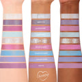 ColourPop In A Trance shadow palette swatches spanning three arms, showcasing pastel purples, pinks, and icy blues in matte, shimmer, and glitter finishes; shade names like Clarity, Mind’s Eye, Daydream BBY, Future Self, and Aura Again visible.