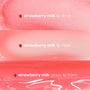 Strawberry Feels ColourPop Lip Care Kit displaying three pink swatches - strawberry milk lip scrub, lip mask, and glossy lip balm - each labeled with a tiny strawberry icon, showing shimmering scrub, creamy mask, and high-shine balm textures.