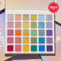 Sweet Fantasy ColourPop Shadow Palette & Brush Set, open to 30 rainbow shades with matte, metallic, and glitter finishes arranged in five rows; square pans from pinks and corals to greens, blues, and purples, in a pastel case with Allure 2021 award badge.