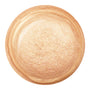 Immediately Yes ColourPop Liquid Highlighter droplet swirling and gleaming, a warm champagne‑gold shimmer with fine sparkle and marbled edges, shown as a large pooled swatch on a white background.