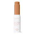 ColourPop Pretty Fresh Tinted Foundation Balm in Dark 17, open twist-up stick showing a warm deep tan shade, standing upright in a white tube with peach “Pretty Fresh” lettering on a clean white background.