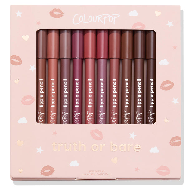 ColourPop Truth or Bare Lippie Pencil kit showcases 10 creamy lip liners in nude, pink, mauve, and brown shades, lined upright behind a clear window in a blush-pink box with hearts, clouds, and lip prints - an everyday neutral gift set.