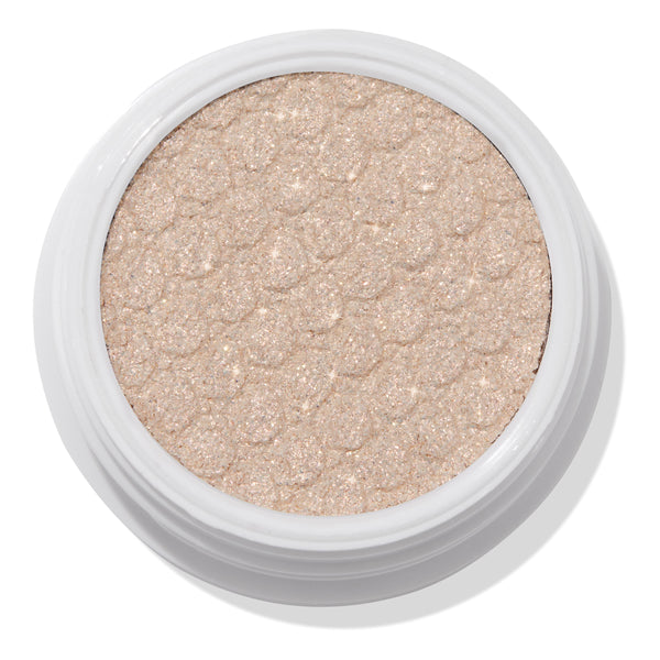 ColourPop 3rd St Super Shock Shadow showing a shimmery champagne‑beige eyeshadow with the signature bouncy, scale-texture pressed finish, sitting in a white round pot against a clean white background.