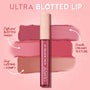 ColourPop Ultra Blotted Lip in Rose Latte, a berry‑pink tube with a beige starry cap, centered over rosy‑berry and nude swatches, showcasing a diffused blotted finish, smooth creamy texture, and long‑lasting comfy wear on a pink promo background.