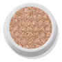 A Little Quarky Super Shock Shadow by ColourPop - sparkly warm champagne–rose gold pigment - fills a round white pot, shimmering with ultra-glitter texture in a close-up studio shot on a white background.