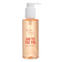 AM to the PM Gel Cleanser face cleanser by ColourPop Fourth Ray Beauty stands upright with a white pump, showing peach-tinted gel in a clear 5.8 fl oz (171 ml) bottle against a white background, ready for daily use.