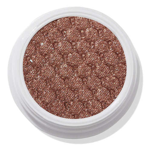 ColourPop Abbot Kinney Super Shock Shadow shimmering rose-gold copper eyeshadow sparkles with a quilted metallic finish, filling a round white pot in a close-up product shot on a white background.
