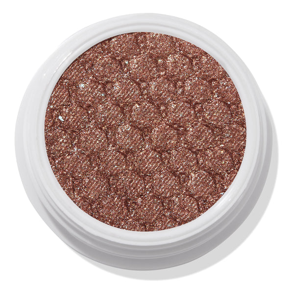 ColourPop Abbot Kinney Super Shock Shadow shimmering rose-gold copper eyeshadow sparkles with a quilted metallic finish, filling a round white pot in a close-up product shot on a white background.