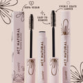 ColourPop Act Natural Mascara, Brown, displays an open tube with dense spoolie beside a closed tube and box, highlighting 100% vegan, easy-to-remove, evenly coats lashes; soft pink packaging with brown floral accents on a beige backdrop.