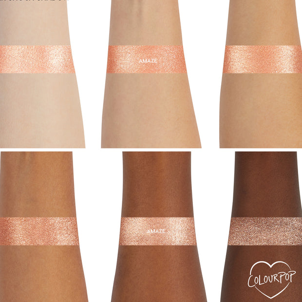 ColourPop Amaze Super Shock Shadow swatched in a bright metallic rose-gold band across six forearms from fair to deep, showing even payoff and sparkle; a heart-shaped ColourPop logo sits in the corner.