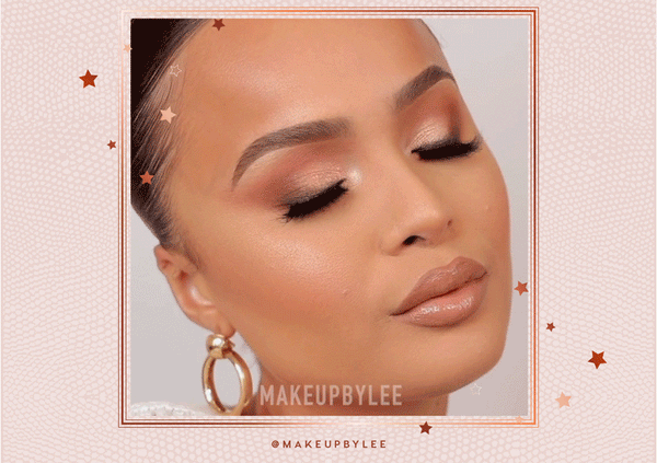 Bare Necessities ColourPop Shadow Palette dusts warm matte and champagne shimmer on closed lids, with inner-corner glow and nude lips, shown in a close-up glam portrait with gold hoop earrings and a peach starry frame.