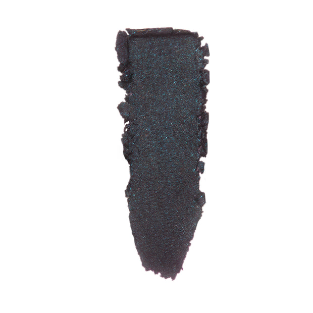Bae Super Shock Shadow by ColourPop swatched in a single swipe, showing a deep plum-black base with teal blue sparkle and a creamy, metallic finish on a white background.