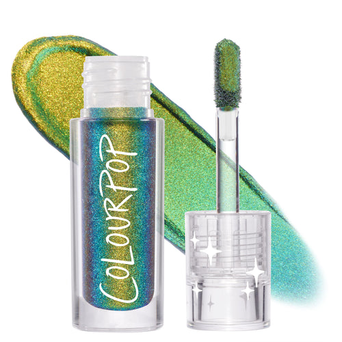 ColourPop Chrome Liquid Shadow in Beetle shifts green, gold, teal, and blue, shown in a clear tube with white ColourPop logo, clear cap with star accents, a doe-foot applicator, and a shimmering swatch on a white background.