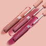 Three ColourPop Ultra Matte Lip tubes and doe-foot applicators swipe nude, rose, and berry pigments across a pink backdrop, highlighting the Berry Pickin' Ultra Matte Lip bundle with star-print peach caps and a long-wearing matte finish.