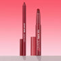 ColourPop Lippie Stix + Pencil Set, Read My Lips, featuring a deep berry lip pencil and matching twist-up lippie stix standing uncapped with caps beside them, tips exposed for application on a pink gradient backdrop.