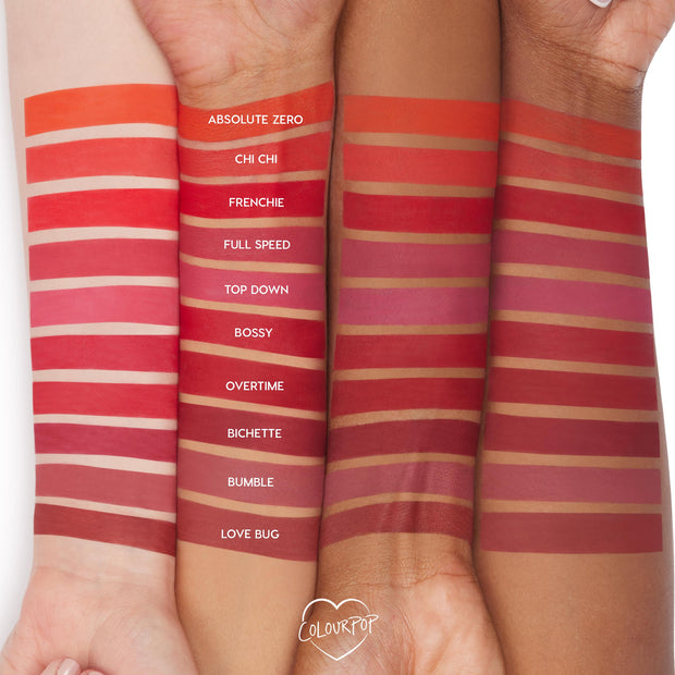 Love Bug Lippie Pencil swatch - a rich terracotta brown - displayed on three arms at the bottom of labeled shade stripes, showcasing the pigment and matte finish of the ColourPop Lippie Pencil across multiple skin tones.