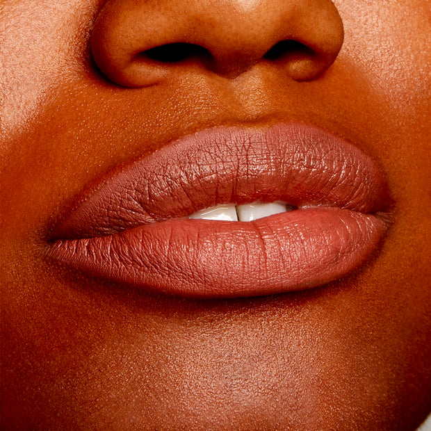 Brink Lippie Pencil lining and filling lips in a warm rosy nude, showing a smooth, creamy matte finish; studio close-up highlights precise edges and full coverage, showcasing the ColourPop Lippie Pencil shade for everyday wear.