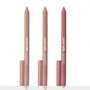 Three ColourPop Lippie Pencil liners from the Cool Besties set stand upright with caps at the base, tips exposed in light beige nude, soft pink nude, and rosy mauve shades against a white studio background.