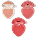 Three heart-shaped blush compacts showcase soft peach, warm coral, and vibrant rosy red pans with built-in mirrors on a white background; Cupid Called, a ColourPop Heart Powder Blush Set delivering buildable powder cheek color.
