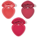 Three heart-shaped powder blush compacts open to show coral, berry, and hot pink pans with built-in mirrors on a white background, Heart to Heart ColourPop Heart Powder Blush Set for buildable, long-wear cheek color.