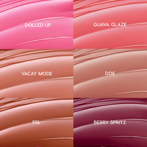 Six glossy swatches show So Balm shades of ColourPop So Juicy Plumping Gloss Balm with Peptides - Dolled Up (bright pink), Guava Glaze (coral), Vacay Mode (peach), Doe (rosy nude), PSL (caramel), Berry Spritz (deep berry) - arranged in a 2x3 grid.
