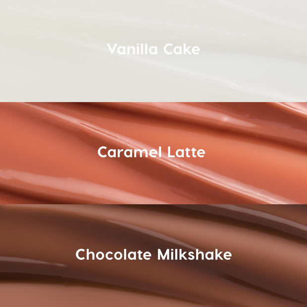 Sweet Treats ColourPop Glossy Lip Balm Trio swatches - sheer clear Vanilla Cake, warm caramel nude Caramel Latte, and rich chocolate brown Chocolate Milkshake - shown as glossy, rippled stripes on a neutral backdrop.