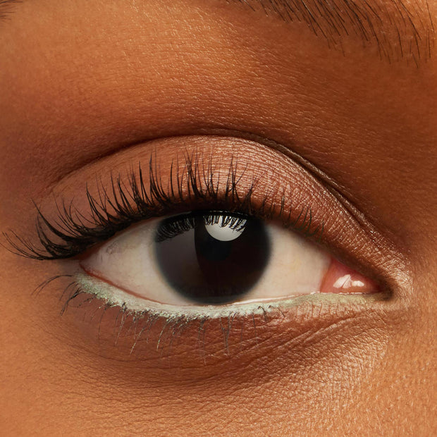 ColourPop Crème Gel Liner in Ice Breaker lining the lower waterline with a pale mint pop, shown in a close-up of an eye with natural lashes and soft neutral shadow to highlight smooth, opaque, precise definition.