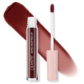 ColourPop Ultra Blotted Lip in Canon Dr shown uncapped with doe-foot applicator and a wide soft-matte swatch in deep brick red on white; clear tube reads Ultra Blotted Lip with a blush-pink starry cap, showcasing a lightweight blurred finish.