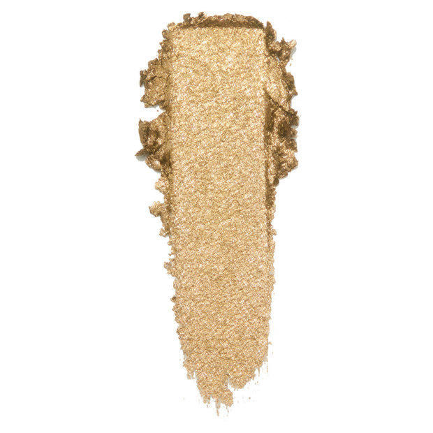 ColourPop Cheap Date Super Shock Shadow swatch - warm metallic gold eyeshadow smeared in a single vertical stroke, showcasing fine sparkle and creamy texture, against a clean white background.