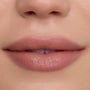 Close-up of a model’s lips wearing Candy Floss Cloud Whip Blurring Liquid Lipstick, showing a soft pink nude shade with a smooth, blurred, satin finish against natural, even-toned skin, highlighting the airy Cloud Whip formula.