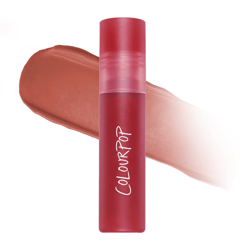 ColourPop Fluffing Cute Cloud Whip Blurring Liquid Lipstick standing upright with a soft matte nude-pink swatch behind it, showcasing the airy Cloud Whip formula and blurred velvet finish on a clean white background.
