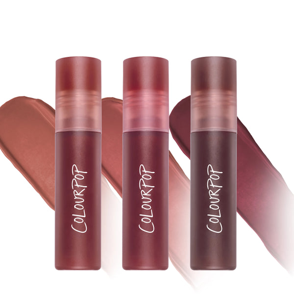 ColourPop Cloud Crushin lip trio standing upright, each frosted tube showing a different rosy nude, mauve, and deep berry shade swatched behind them, presented as a makeup gift set for beauty lovers shopping lip Value Sets.