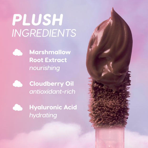 Cloud Crushin lip trio doe-foot applicator swirled with whipped mauve liquid lipstick against a pink and purple cloud background, highlighting plush ingredients—marshmallow root extract, cloudberry oil, and hyaluronic acid—promoted as nourishing Value Sets.