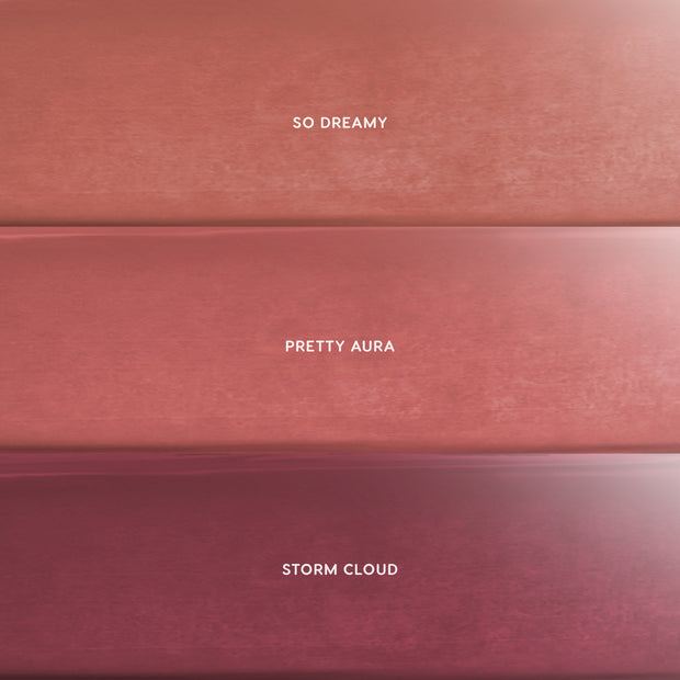Cloud Crushin lip trio swatches showing three CloudWhip Blurring Liquid Lipstick shades—warm nude So Dreamy, rosy mauve Pretty Aura, and deep berry Storm Cloud—stacked in horizontal bars on a soft gradient background, ideal for makeup value sets shoppers.