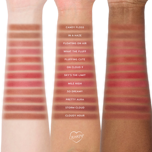 Cloud Crushin lip trio value set swatched on three skin tones, showing multiple nude and rosy shades of CloudWhip blurring liquid lipstick in neat horizontal stripes labeled by shade name for easy comparison.