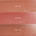Heavenly Nudes lip trio swatches showing three liquid lipstick shades in a horizontal grid—peachy nude Candy Floss, rosy nude Fluffing Cute, and warm beige Cloudy Hour—promoting the CloudWhip Blurring Liquid Lipstick value sets for US shoppers.