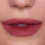 Close-up of softly blurred ombre lips wearing Petal Cloud Lip Ombre Duo, showing a gradient pink-mauve matte finish on smooth skin, highlighting the CloudWhip-inspired lip look for beauty Value Sets shoppers.