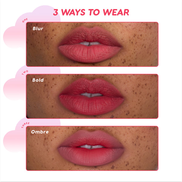 Close-up of lips demonstrating three ways to wear Cloud Kissed full collection set Cloud Whip lipstick—blurred soft-focus tint, bold saturated color, and ombre gradient finish—shown on freckled skin against a white and pink cloud-themed background.