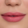 Close-up of smooth, softly blurred pink lips wearing On Cloud 9 Cloud Whip Blurring Liquid Lipstick, showing velvety matte finish and even color payoff against flawless skin for a natural everyday makeup look.