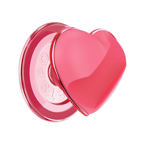 Heart-shaped glossy pink phone grip extends from a clear round base, side profile, featuring the ColourPopSockets design from the ColourPop x PopSockets collab on a white background, styled to pair with ColourPop Lip Stain.
