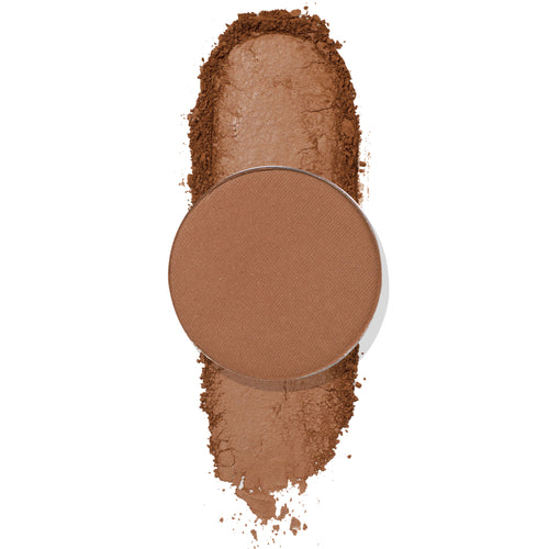 Conundrum pressed powder shadow by ColourPop showing a round pan of matte warm brown eyeshadow resting over a vertical swipe of crushed pigment on a white background.